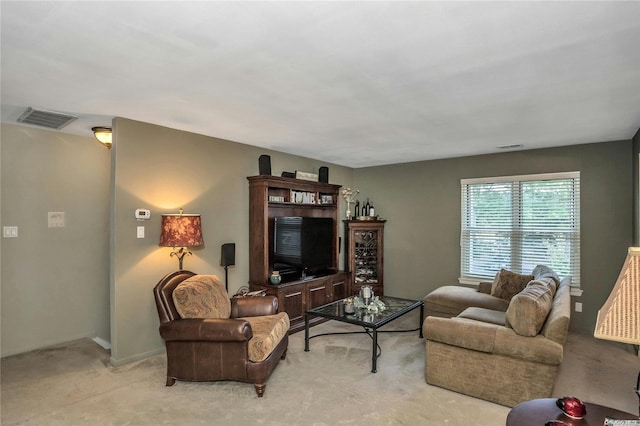 living room featuring light colored carpet