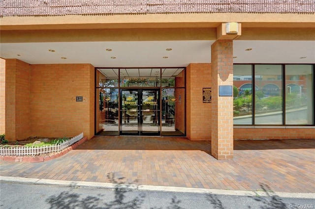 property entrance featuring french doors