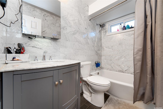 full bathroom featuring shower / bath combination with curtain, toilet, decorative backsplash, vanity, and tile walls