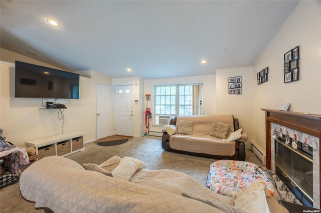 49 Concord Rd, Shirley, NY 11967 - living room featuring baseboard heating, carpet, a glass covered fireplace, recessed lighting, and baseboards