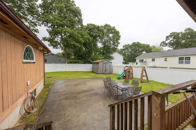 49 Concord Rd, Shirley, NY 11967 - view of patio / terrace with a storage shed, a playground, and an outbuilding