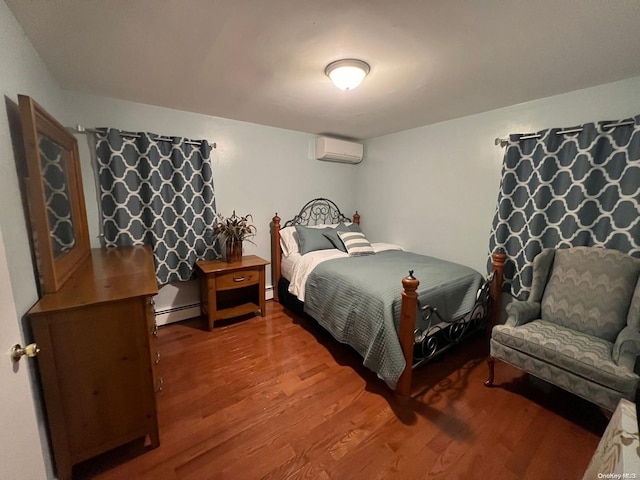 bedroom with wood-type flooring, a wall unit AC, and baseboard heating