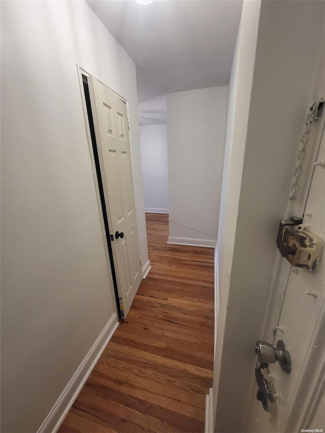 hall featuring dark hardwood / wood-style flooring