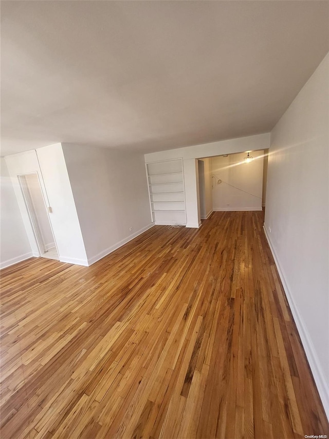 unfurnished living room with light hardwood / wood-style floors