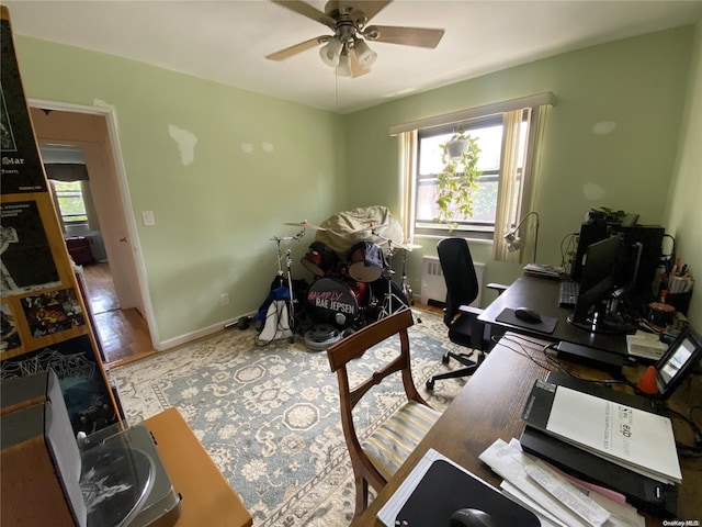 office space featuring ceiling fan