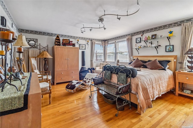 bedroom featuring light hardwood / wood-style floors