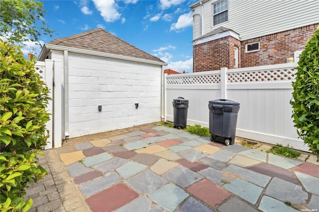 view of patio / terrace featuring an outdoor structure