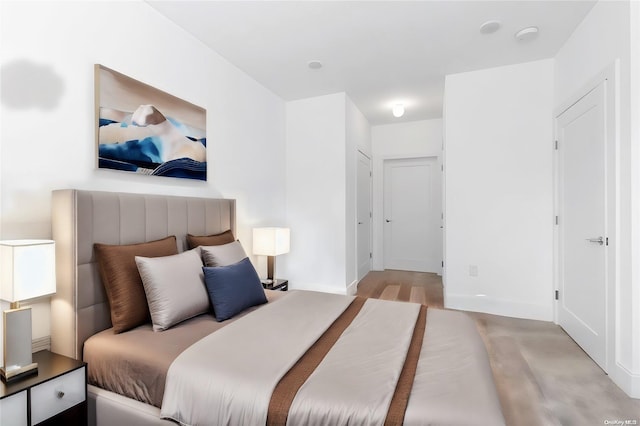 bedroom featuring light hardwood / wood-style flooring