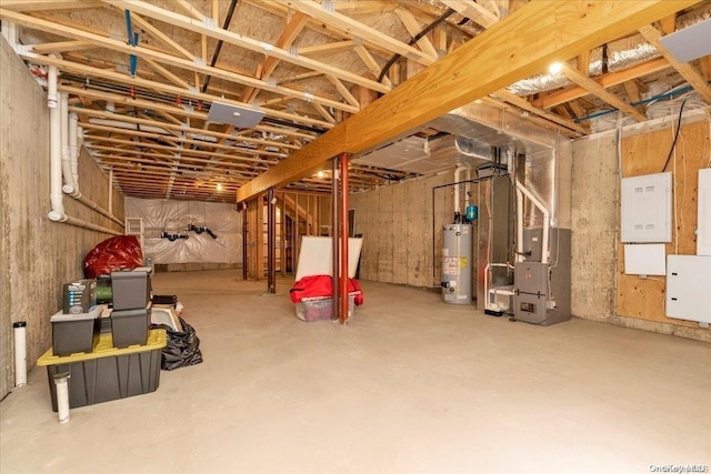 basement with heating unit and gas water heater