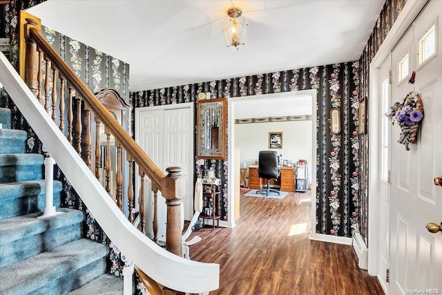 765 Sheep Pen Rd, Call Listing Agent, NY 13849 - entryway featuring stairs, wood finished floors, wallpapered walls, and baseboards
