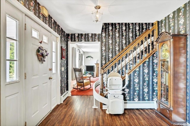 765 Sheep Pen Rd, Call Listing Agent, NY 13849 - entryway with wallpapered walls, wood finished floors, and baseboards