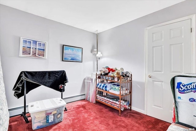 miscellaneous room featuring carpet floors and a baseboard radiator