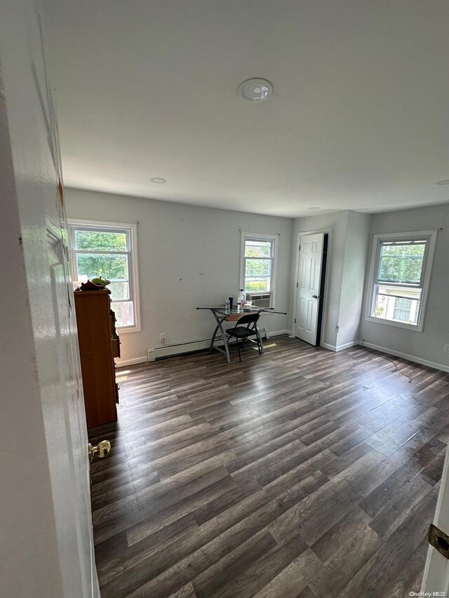 interior space with dark hardwood / wood-style flooring