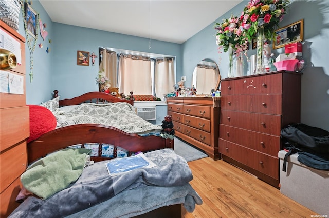 bedroom featuring light hardwood / wood-style flooring