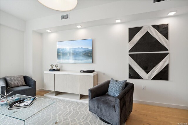 sitting room featuring light wood-type flooring