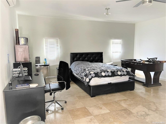 bedroom with ceiling fan and a wall mounted air conditioner