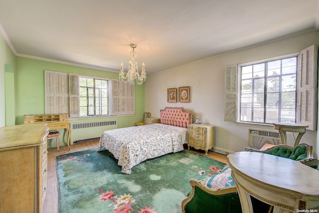 bedroom with hardwood / wood-style flooring, radiator heating unit, ornamental molding, and multiple windows