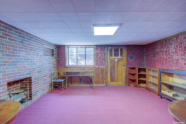 interior space with wood walls and carpet floors