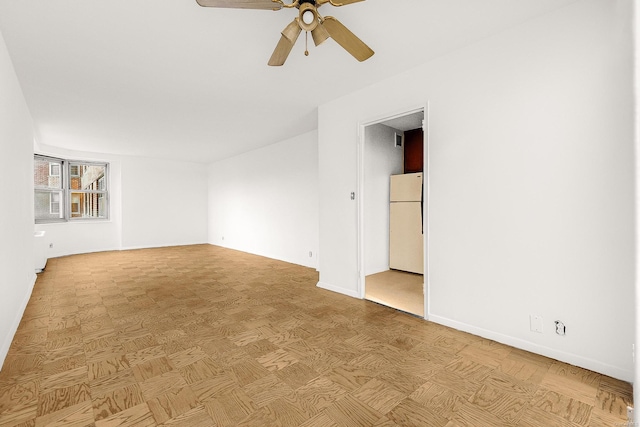 unfurnished room featuring ceiling fan