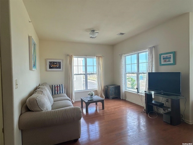 sitting room with hardwood / wood-style floors