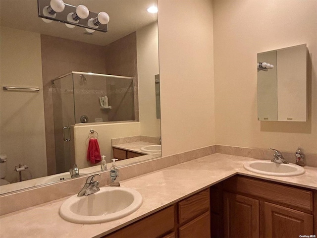 bathroom with vanity and walk in shower