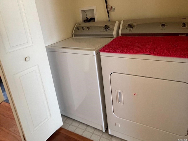 washroom with washer and clothes dryer