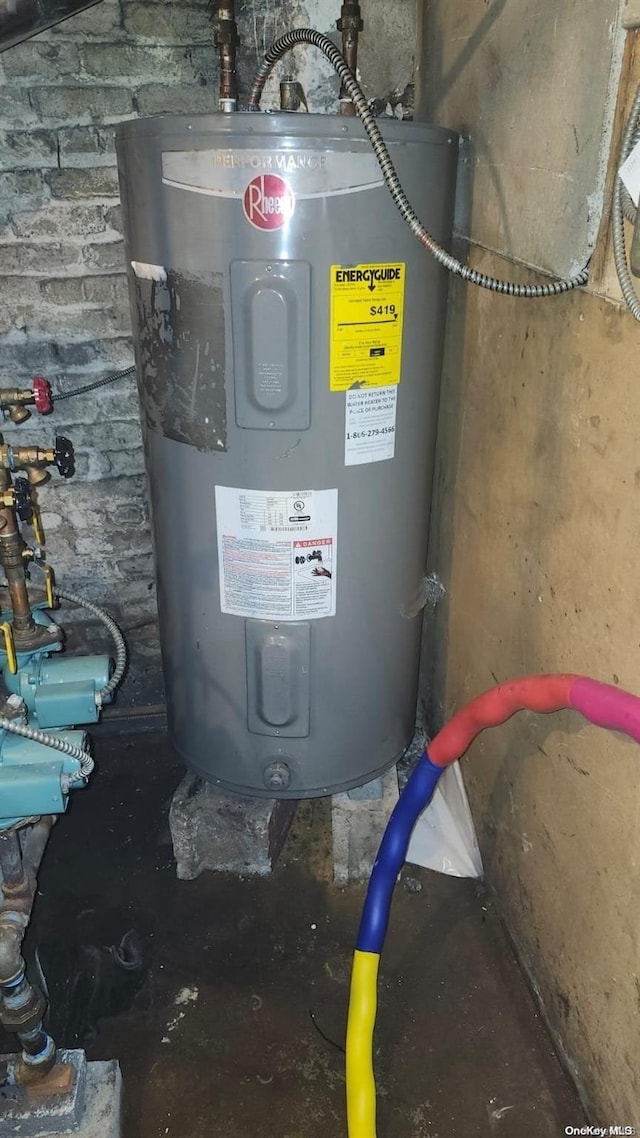 utility room with electric water heater