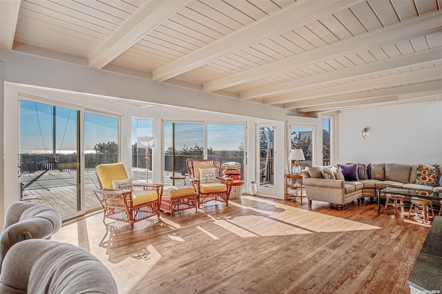 sunroom with beamed ceiling and wood ceiling