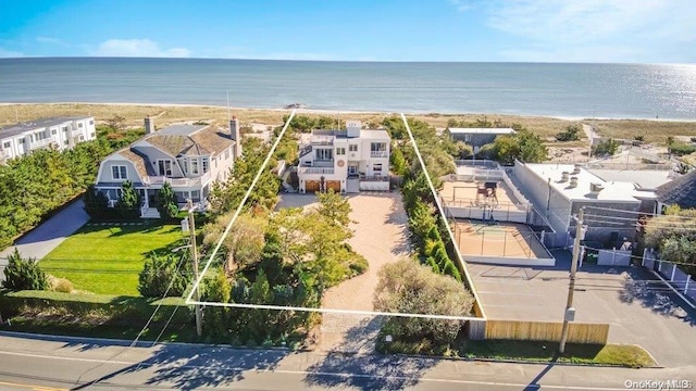 aerial view with a beach view and a water view