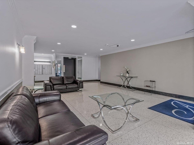 living room featuring crown molding