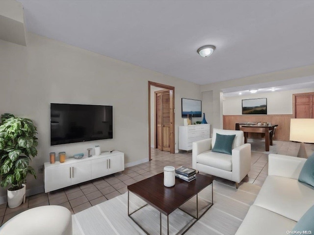 living room with tile patterned floors