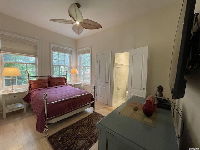 134 Middle Pond Rd, Southampton, NY 11968 - bedroom featuring light wood-style floors, ensuite bath, and a ceiling fan