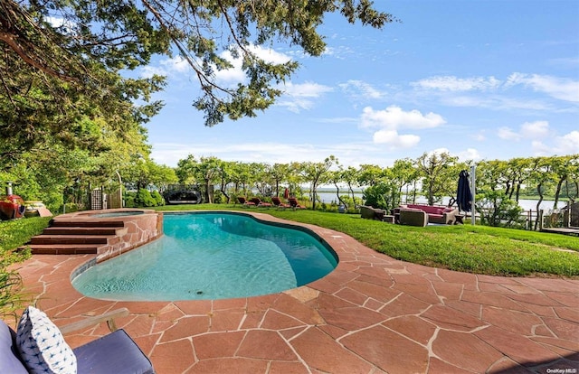 view of swimming pool featuring an outdoor living space, a patio area, and an in ground hot tub