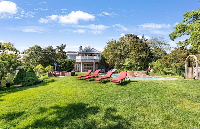 134 Middle Pond Rd, Southampton, NY 11968 - view of green lawn featuring an outdoor pool, a balcony, and a patio area