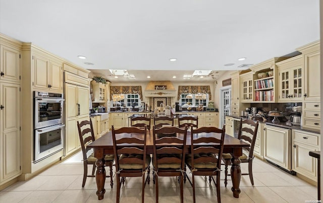 dining area with light tile patterned flooring