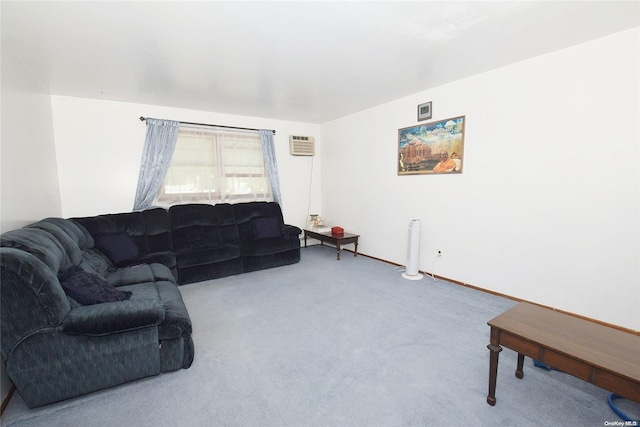 carpeted living room featuring a wall unit AC