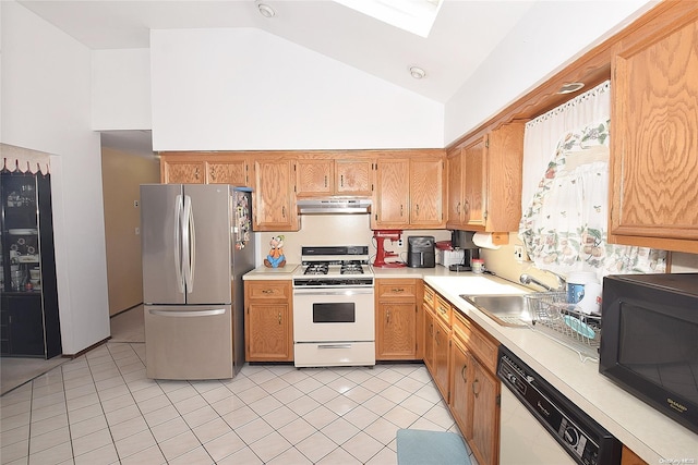 kitchen featuring sink, white appliances, high vaulted ceiling, and light tile patterned flooring