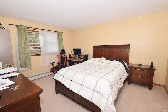 bedroom featuring baseboard heating and light colored carpet