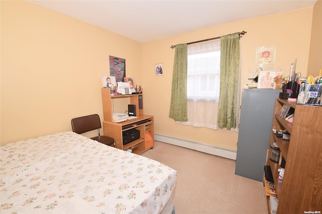 carpeted bedroom with a baseboard radiator