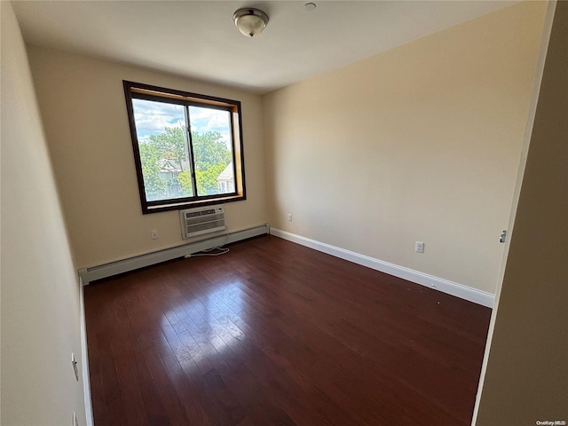 unfurnished room featuring an AC wall unit, a baseboard radiator, and dark hardwood / wood-style floors