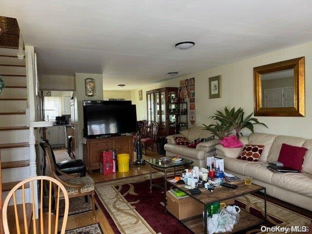 living room with wood-type flooring