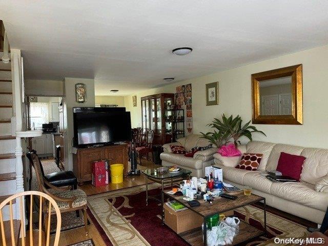 living room featuring dark hardwood / wood-style flooring