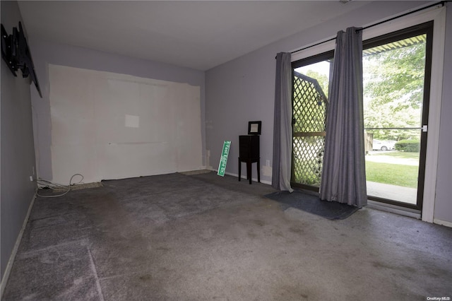 unfurnished room featuring carpet