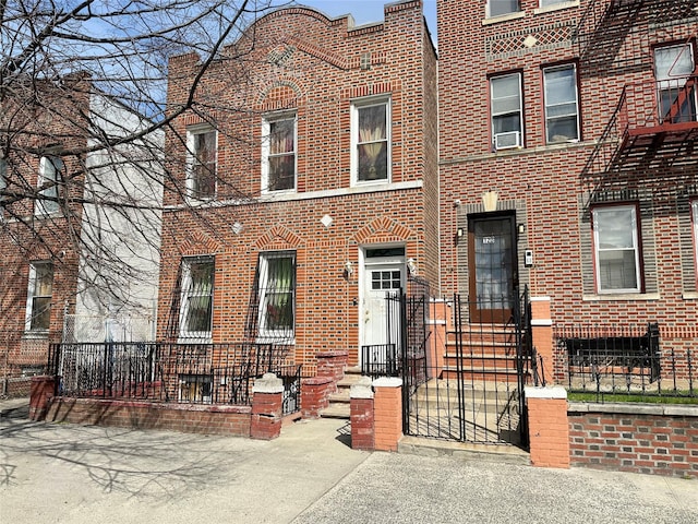 view of front of property featuring cooling unit