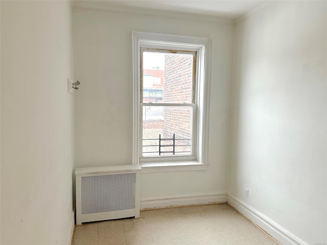 empty room featuring radiator