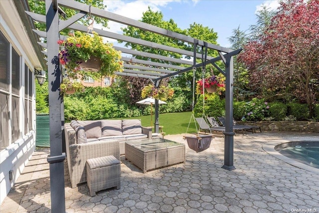 view of patio featuring outdoor lounge area and a pergola