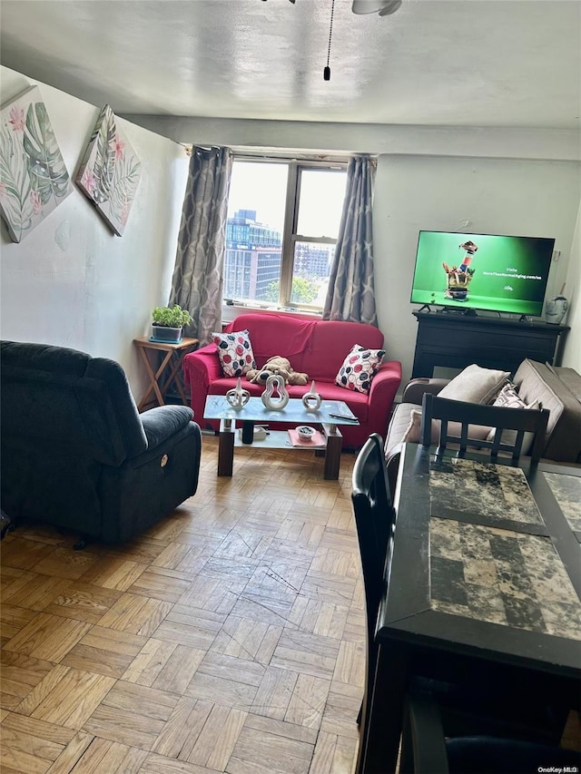 living room featuring light parquet flooring