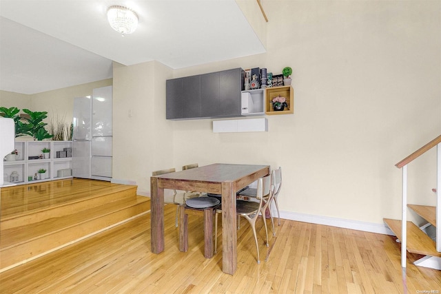 dining area with light wood-type flooring