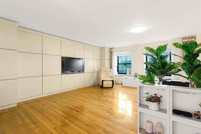 unfurnished living room featuring light hardwood / wood-style floors