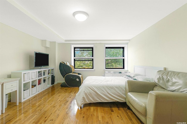 bedroom with light wood-type flooring